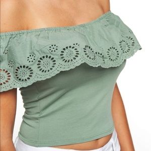 Green of the shoulder top